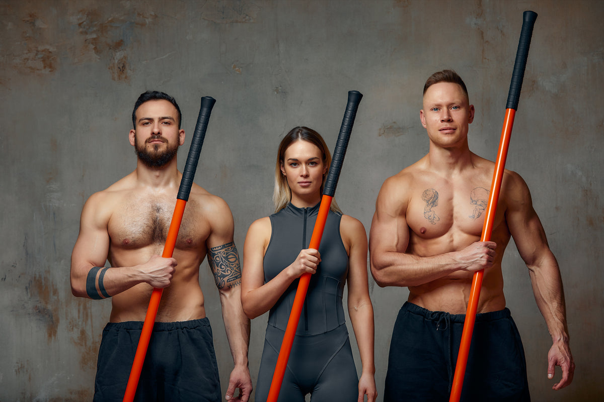 two-men-and-woman-aikido-fighters-with-wooden-figh-2025-01-09-12-43-43-utc.jpg